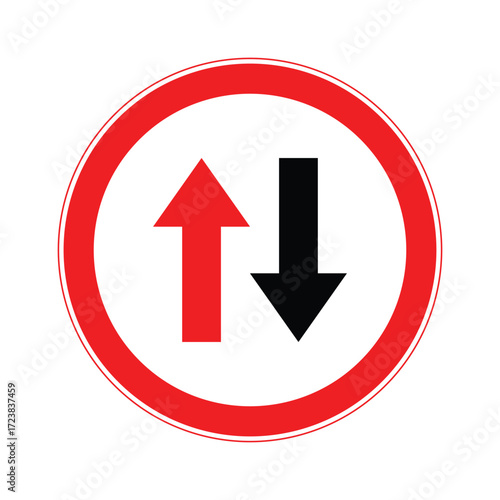 Oncoming traffic priority sign with red upward arrow and black downward arrow.