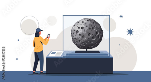 A curious woman captures a meteorite at a museum exhibit with her smartphone creating a memory