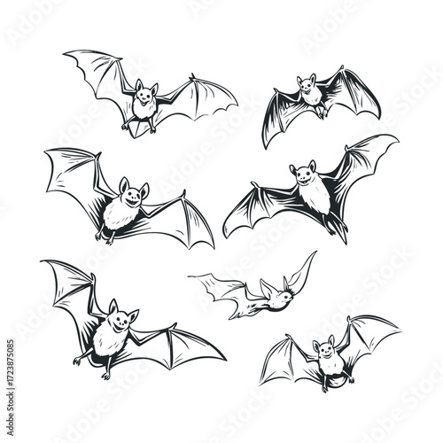 Set of hand-drawn bats flying with spread wings.