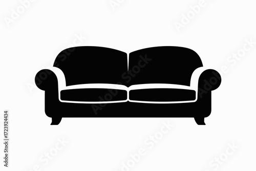 Comfortable black sofa with white trim against a plain background
