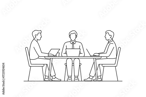 Three colleagues collaborate around a table with laptops, discussing ideas in a modern office setting.