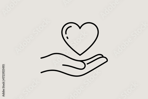 Gentle hand cradles a delicate heart, symbolizing care and love.