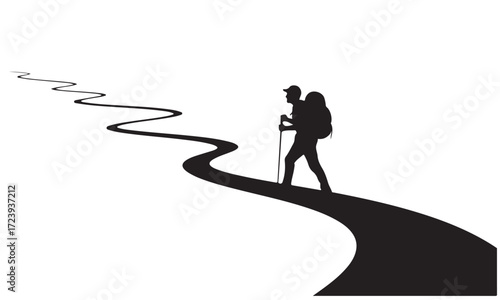 Silhouette of a Solo Hiker Walking Along a Winding Path