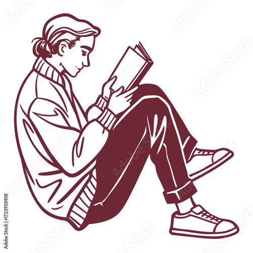 Young person with hair in a bun wearing a sweater and jeans sitting and reading a book