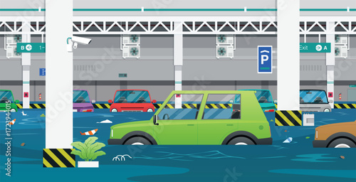 Cars submerged in underground parking lot.