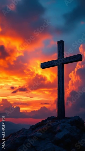 Sunset cross on mountaintop