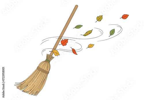 Sweeping autumn leaves with a broom on a windy day.
