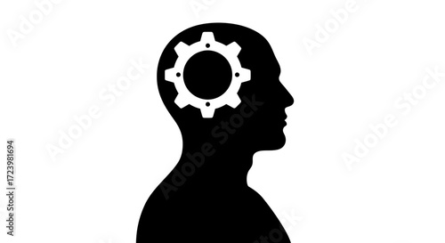Conceptual human head silhouette with gear inside representing thinking process