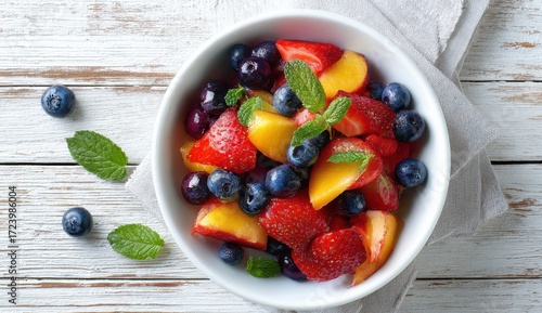 Colorful fruit salad in a white bowl (3)