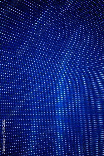 Festive blue decorative lighting in a perspective concept. Background texture with LED lighting, selective focus