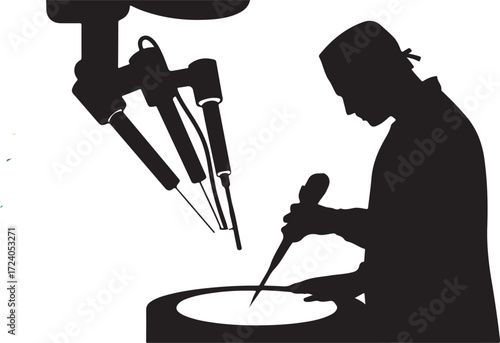 Silhouette of surgeon operating with robotic surgical system surgery robotic surgery