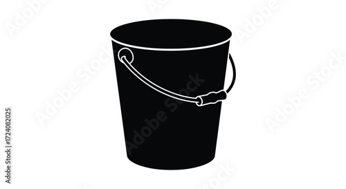 A simple black bucket with a handle is shown a dark silhouette