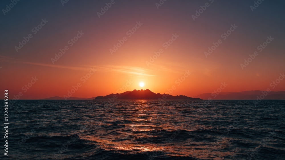 Obraz premium Sunset over island silhouette