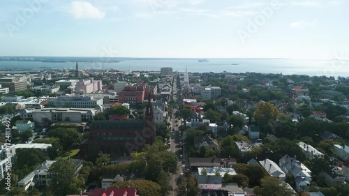 Charleston South Carolina city drone shot during the day flying down broad street towards four corners