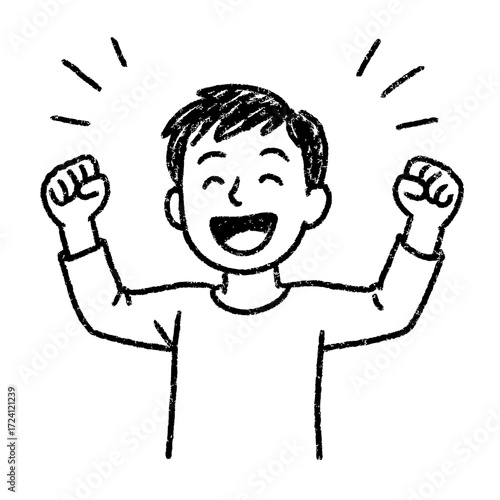 Happy boy celebrating with raised fists and a big smile  