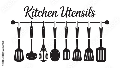 Collection of kitchen utensils hanging on a rack