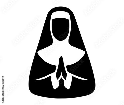 Nun in traditional habit with hands clasped in prayer, a symbol of faith and devotion