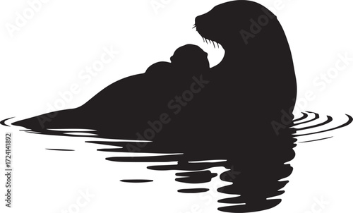 Seal pup and mother in water swimming