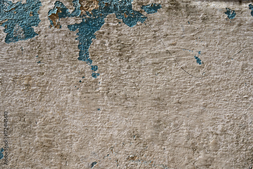Authentic old wall with peeled paint as background.