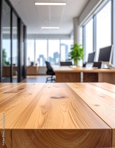Blurry modern office interior, light wooden table top