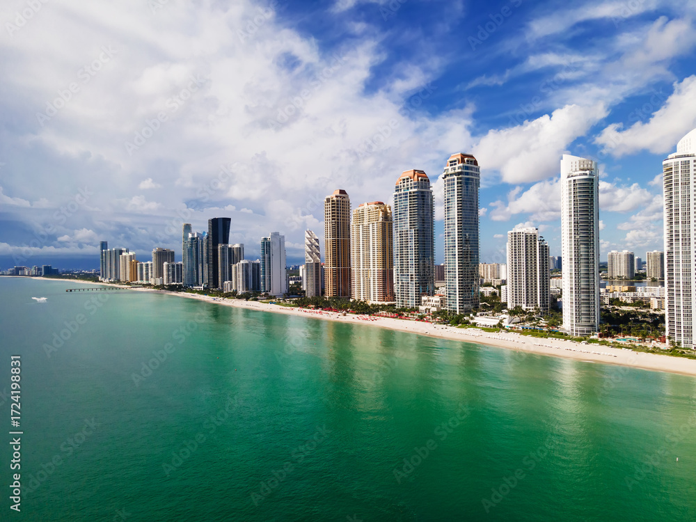 Naklejka premium Scenic Aerial View of Sunny Isles Beach. Skyscrapers and Calm Atlantic Waters