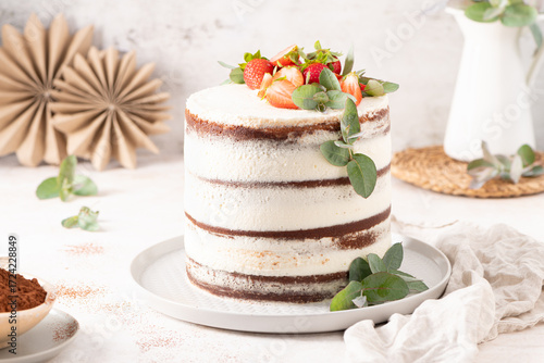 Wallpaper Mural Striking naked cake with layers of rich chocolate and vanilla cream, elegantly topped with fresh strawberries and eucalyptus Torontodigital.ca