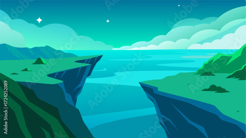 Looking down from the top of the cliff the emerald green hills meet the sparkling azure waters creating a breathtaking contrast of colors against the canvas of the sky.