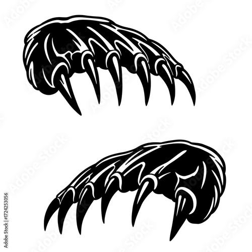 Black silhouette of sharp animal claws.