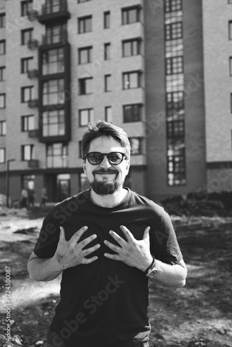 young man in sunglasses. black and white image