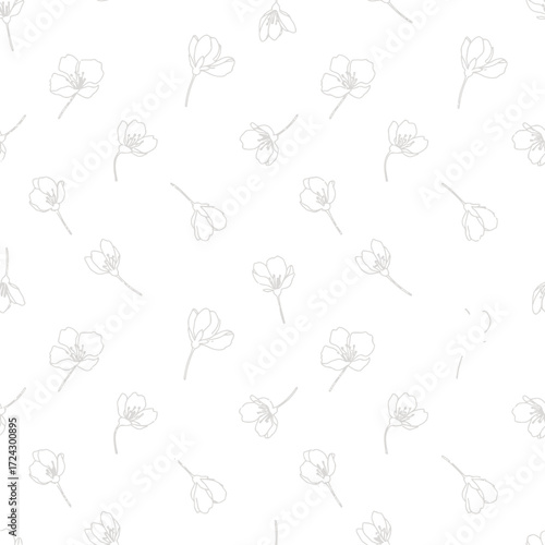 Elegant hand drawn floral seamless pattern with scattered minimalist flowers.