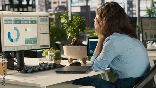 Картината върху платно Employee at office desk getting upset after noticing mistake while editing documents, typing on keyboard