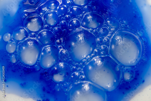 Close up of Blue Copper Peptides in Powder and Liquid Form