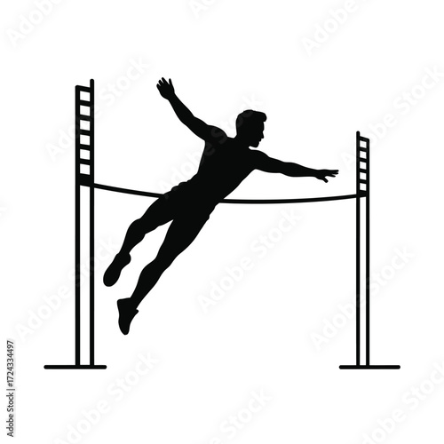 Silhouette of a high jumper clearing the bar athlete