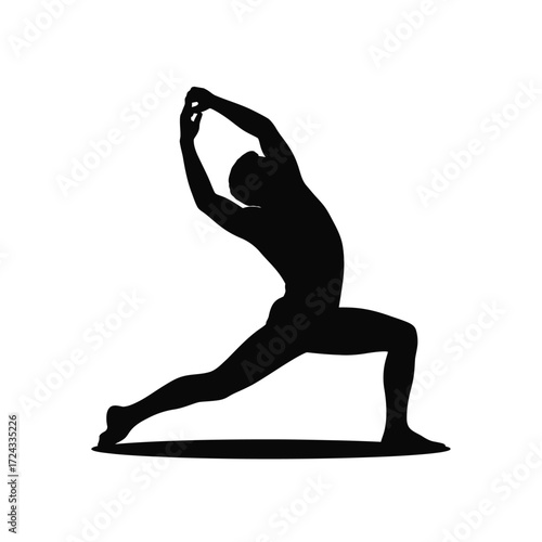 Silhouette of a person in a yoga warrior pose stretching