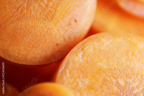 Close up shot of sliced carrot as background