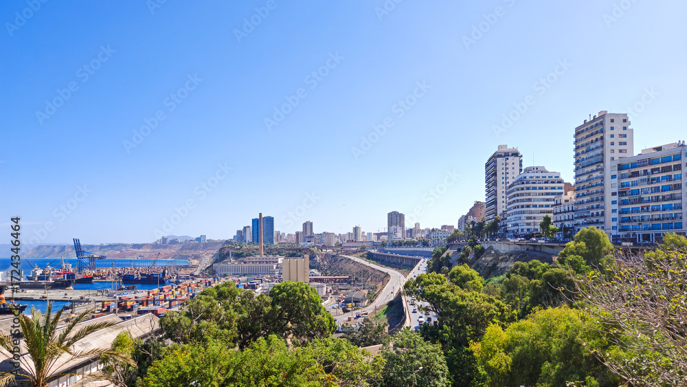 Fototapeta premium Oran Cityscape: Modern Skyline and Industrial Port overlooking the Mediterranean Coast of Algeria