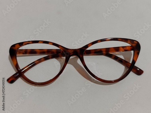 Stylish tortoise shell eyeglasses placed on a clean white background. Perfect for fashion, accessories, and lifestyle concepts