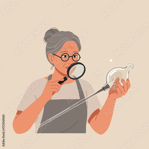 Woman examines a glass bird