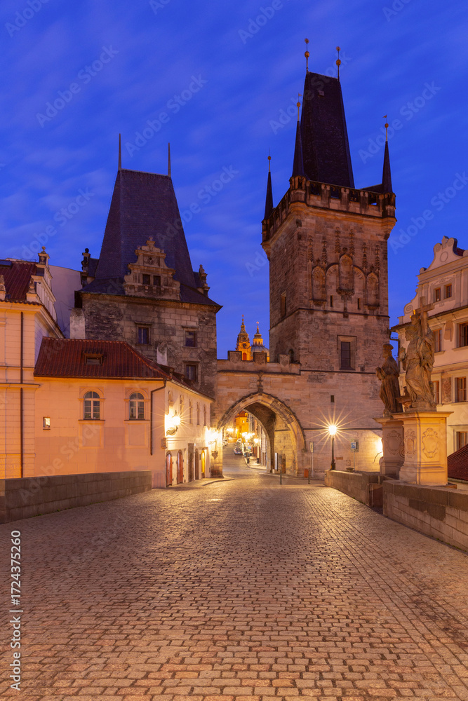 Fototapeta premium Lesser Town Bridge Towers at sunrise, Prague, Czech Republic