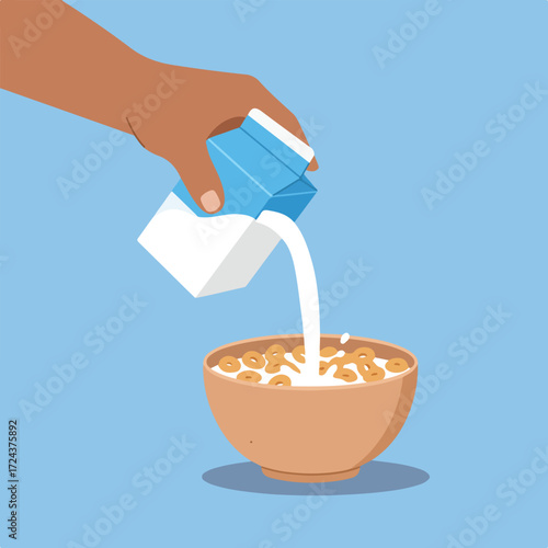 Arm pouring milk from carton into cereal bowl