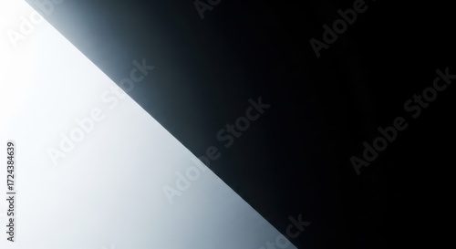 Diagonal gradient divide between white and black abstract background image