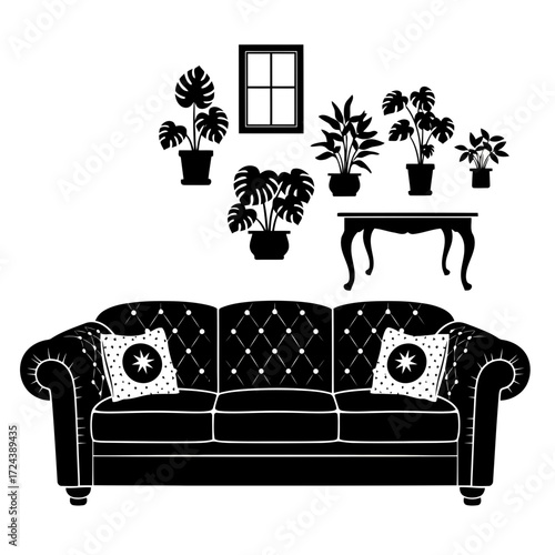 Black tufted sofa with potted plants and window