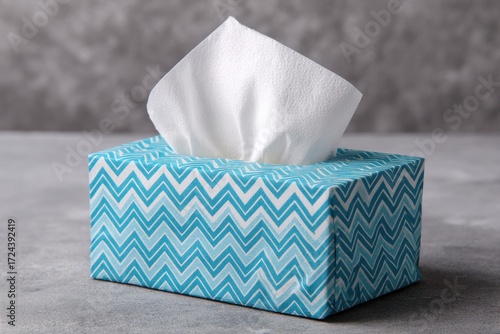 Tissue box with light-blue chevron pattern