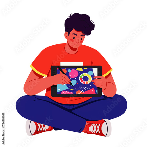 Young man sitting cross-legged, creating digital art on a tablet with a stylus, surrounded by colorful shapes and designs.