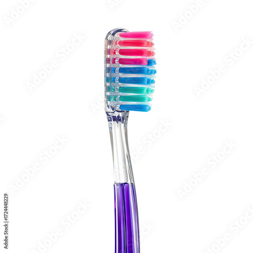 Close-up of a toothbrush head with vibrant colored bristles
