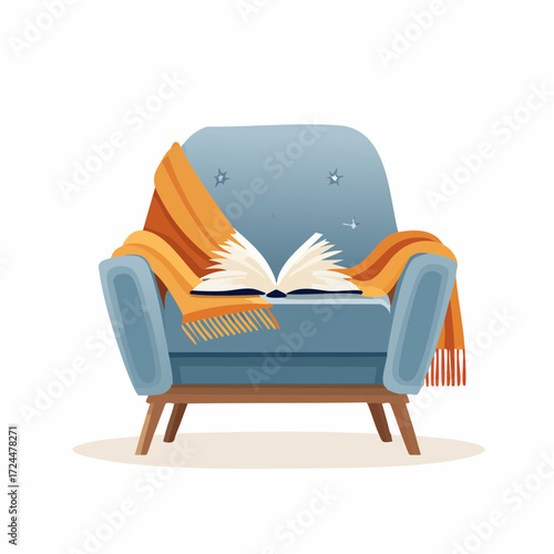 Cozy armchair with an open book and a warm blanket, perfect for a relaxing reading session indoors