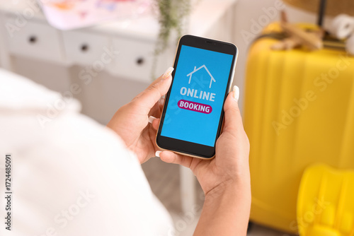 Female tourist with phone a...
