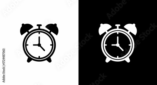 Timeless Alarm Clock: The simple design of an alarm clock, set against a contrasting backdrop, captures the essence of punctuality and the cyclical nature of time.
