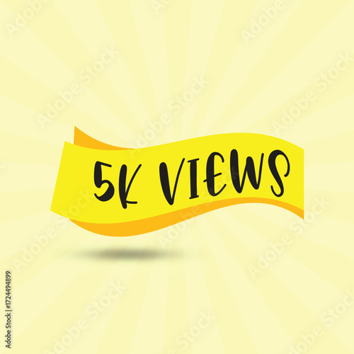 A yellow banner with the words 5k views in black against a yellow background