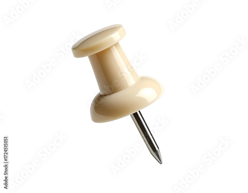 Cream-colored push pin, slightly angled, isolated on black background